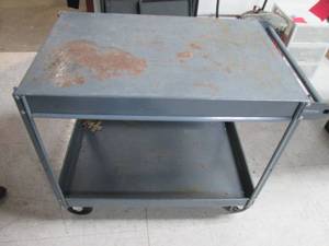 lot 76 image: Metal 2-tier shop cart