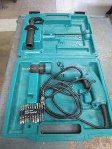 lot 80 image: Makita electric hammer drill in case with bit attachments