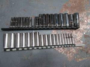lot 87 image: Craftsman deep well SAE and Metric socket sets in 14 and 38 on rail clips