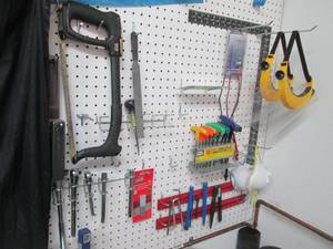 lot 92 image: Wall lot consisting of Craftsman ratchets. files, hex keys, magnetic tool strips and more