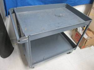 lot 118 image: Metal 2-tier shop cart...