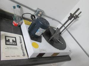 lot 126 image: Tyler test sieve shaker with manual and some pyrex cups and tubes