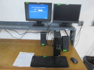 lot 127 image: Dell OptiPlex 5050 computer tower with Logitech wireless keyboard and mouse, two ThinkVision Monitors and Altech-Lansing speakers