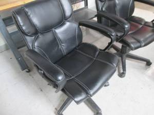 lot 129 image: (2) executive padded rolling office chairs