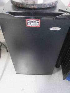 lot 130 image: Black Haier mini fridge...