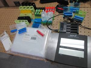 lot 146 image: Large assortment of 18650 batteries, cases, charger, work lights, jumper cables and more
