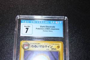 lot 13 image: 1997 Pokemon Japanese Rocket Gang Dark Electrode #101 CGC 7