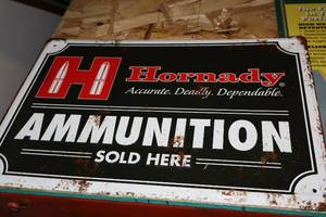 lot 503 image: Hornady Ammunition Sold Here logo Metal Sign