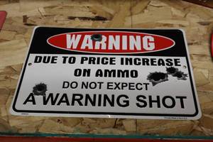 lot 495 image: Due To Price Increase On Ammo Do Not Expect A Warning Shot logo Metal Sign