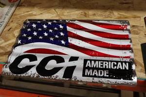 lot 499 image: Cci American Made logo Metal Sign
