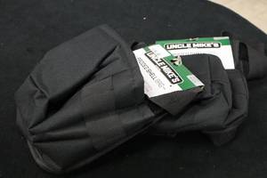lot 413 image: Lot of (2) Uncle Mikes Padded Shell Bag