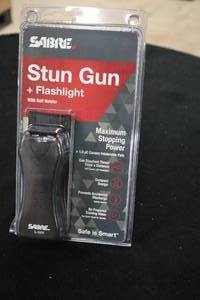 lot 417 image: Sabre S-1005 Stun Gun  Flashlight w Belt Holster