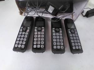 Set of 4 Panasonic Cordless Telephones, Arris WiFi Box and Amino Television Box