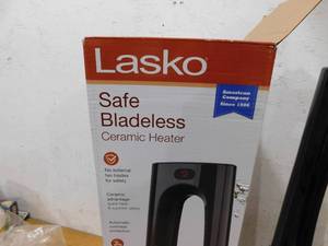 Lasko Bladeless 1500W 28 in. Black Electric Oscillating Tower Ceramic Space Heater with Remote Control and Digital Display