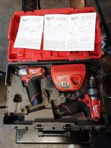 lot 27 image: Milwaukee M12 hammer drill, imapact driver combo kit