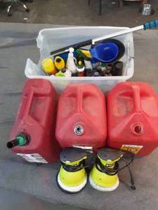 lot 49 image: 2 ryobi polishers and assorted automotive chemicals and gas cans (no spouts)