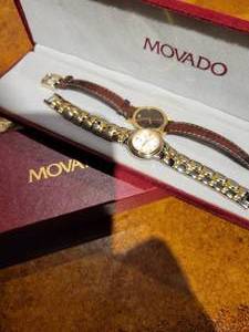 lot 53 image: Movado and ESQ watches.