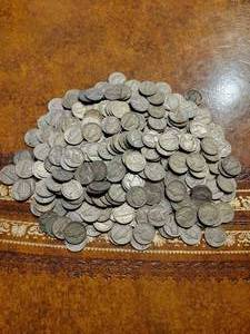 lot 57 image: 263 Silver War Nickels 1942 - 1945 .   45.5 ounces. 35% Silver.