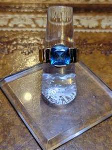 lot 62 image: 14k Yellow Gold  Blue Center Stone 9 x 9 mm.