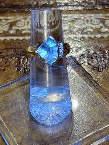 lot 65 image: 14k Yellow Gold  11mm x 8mm Lt Blue Aqua colored stone.