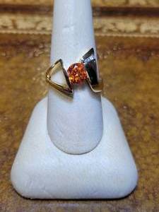 lot 66 image: 14k Yellow Gold & Diamond Ring  7mm amberorange colored stone.