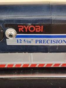 lot 16 image: Ryobi 12 516 Precision Surface Planer Mounted on a Rolling Stand
