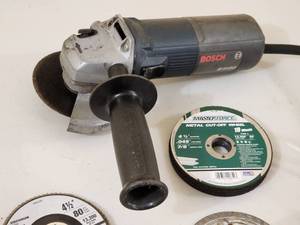 lot 54 image: Bosch Electric Angle Grinder with Assorted Discs