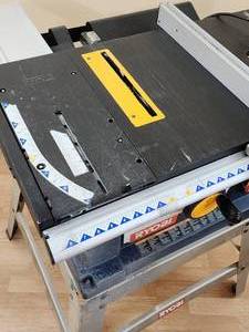 lot 3 image: Ryobi 10 Portable Table Saw with Stand
