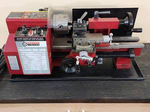 lot 4 image: Central Machinery 7 X 10 Precision Mini Machinist Lathe Mounted on a Rolling Cabinet