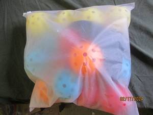 new pickle balls in various colors...
