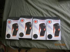4 new copper lined knee braces...