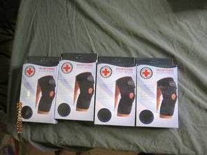 4 new copper lined knee braces...
