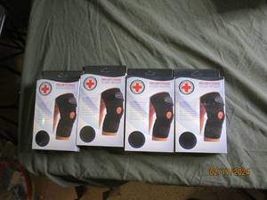 4 new copper lined knee braces...