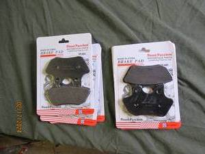 6 new break pads fpr a motorcyle believe they fit harleys