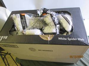 box of white spiderwebs...