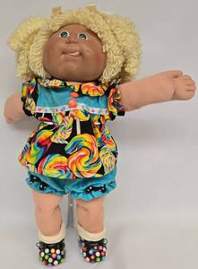 lot 64 image: Vintage Cabbage Patch Girl Doll wTongue Out in M&M Outfit