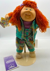 lot 83 image: Vintage Transitional HASBRO HM#19 OrangeRed Kinky Haired CABBAGE PATCH Girl w a Toothy Smile & Designer Line Clothing
