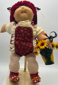 lot 161 image: Vintage RED Reroot Hair w Bohemian Braids Icy Brown Eyes & Freckles, One Tooth Smile