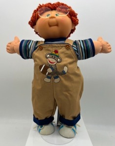 lot 166 image: 25th Anniversary CABBAGE PATCH Red Head Poodle Hair Green Eyed Boy In Glasses Play Along