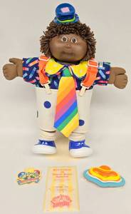 lot 21 image: Vintage Cabbage Patch African American Girl in Clown Outfit 
