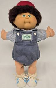 lot 19 image: Cabbage Patch 25th Anniversary Brown Fuzzy Boy Original Clothes