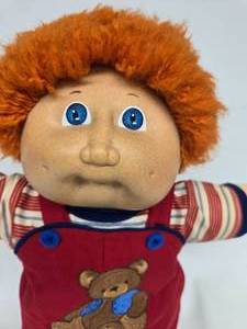 lot 27 image: Vintage Cabbage Patch Orange  Red Fuzzy Boy Hong Kong