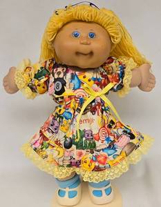 lot 147 image: Vintage Cabbage Patch Girl Doll in Emoji Dress