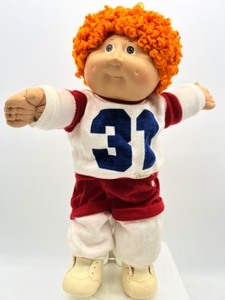 lot 142 image: Vintage Cabbage Patch Orange Hair Boy Doll in Original CPK Outfit 