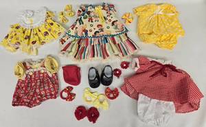 lot 233 image: 5 Red & Yellows Cabbage Patch Outfits and Accessories