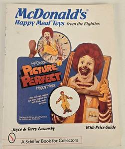 lot 264 image: Vintage McDONALDs Happy Meal Toys from the 80s Book