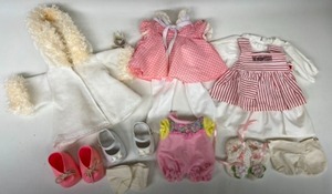 lot 243 image: Vintage Lot of CABBAGE PATCH CLothing BABYLAND Candy Striper Nursing Outfit & More