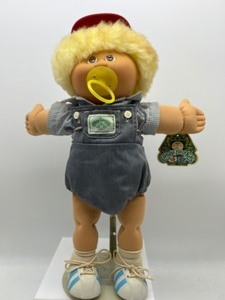 lot 8 image: 25th Anniversary CABBAGE PATCH Blonde Fuzzy Boy w Paci and Red Hat Original Hang Tag Play Along