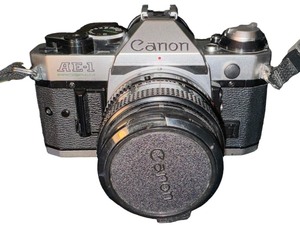 CANNON AE-1 CAMERA CASE AND EXTRAS