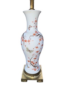 Mid-century porcelain table lamp featuring a base adorned with a Greek key design.